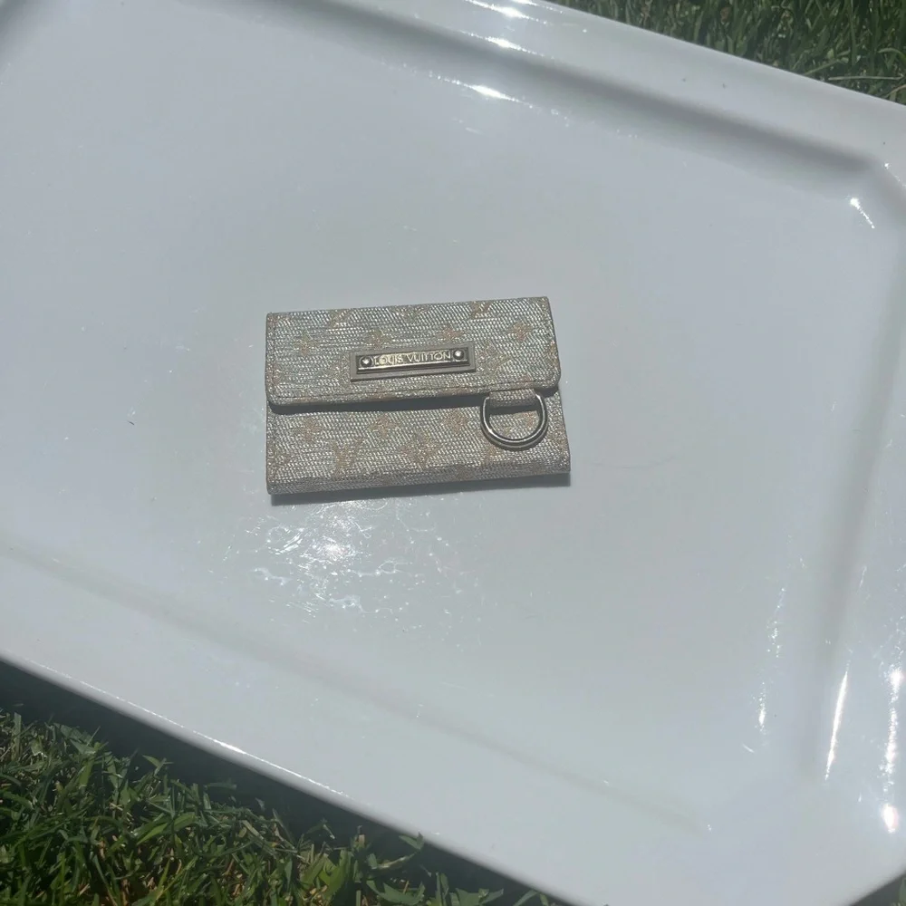 LOUIS VUITTON MINI LIN SHINE MONOGRAM WALLET